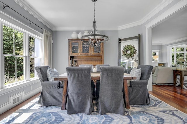 10 Paddock Way, Falmouth, ME 04105 - dining space featuring a chandelier, wood finished floors, and ornamental molding