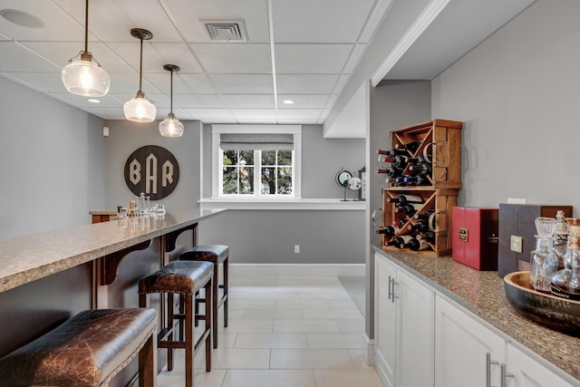 10 Paddock Way, Falmouth, ME 04105 - indoor dry bar featuring pendant lighting, a paneled ceiling, light tile patterned floors, and recessed lighting
