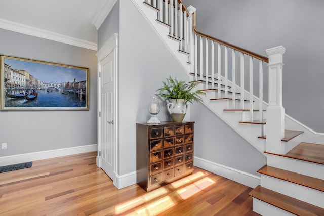 10 Paddock Way, Falmouth, ME 04105 - stairway with wood finished floors and ornamental molding