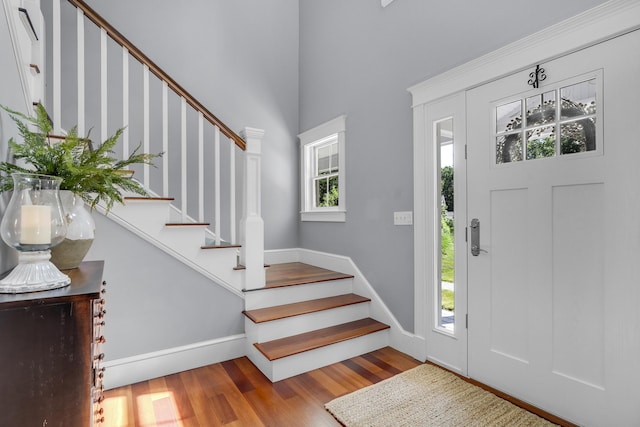 10 Paddock Way, Falmouth, ME 04105 - foyer with stairs, wood finished floors, and a towering ceiling