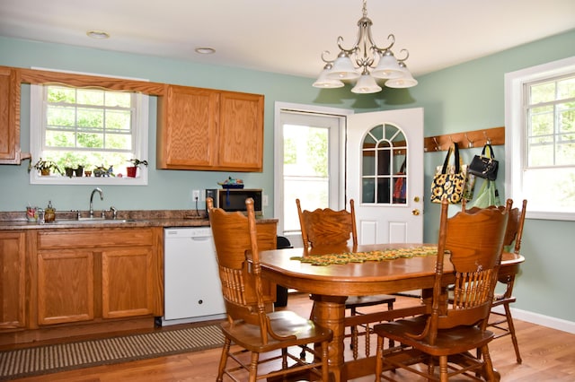 15 Good Heart Ln, Orrington, ME 04474 - dining room with light wood-type flooring and a chandelier