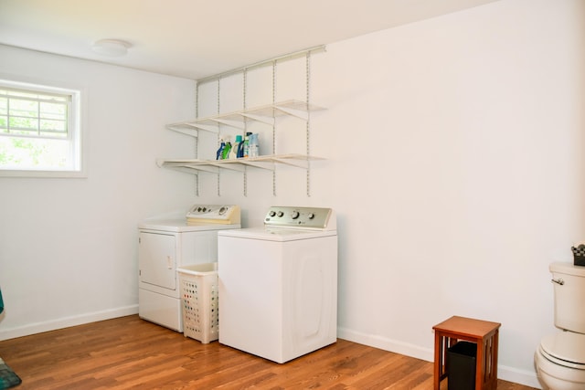 15 Good Heart Ln, Orrington, ME 04474 - washroom featuring washing machine and clothes dryer and light wood finished floors