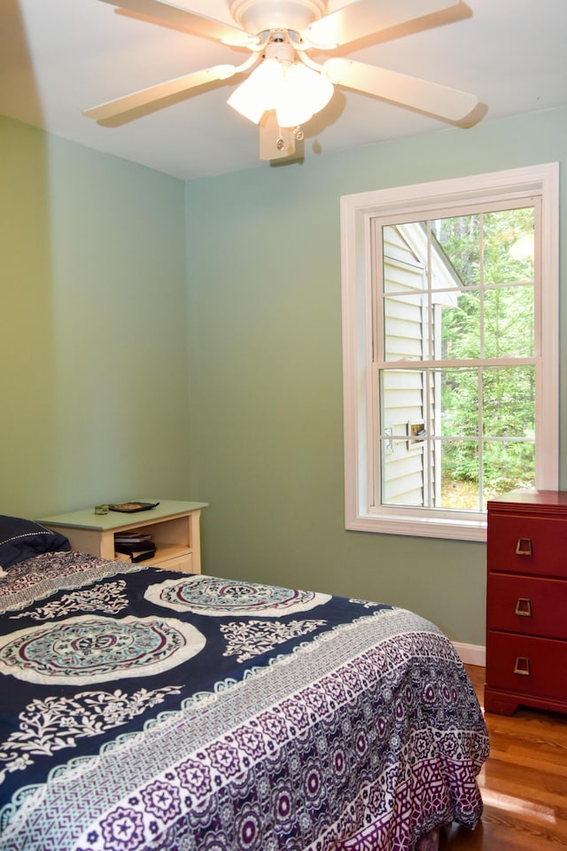 15 Good Heart Ln, Orrington, ME 04474 - bedroom with multiple windows and wood finished floors