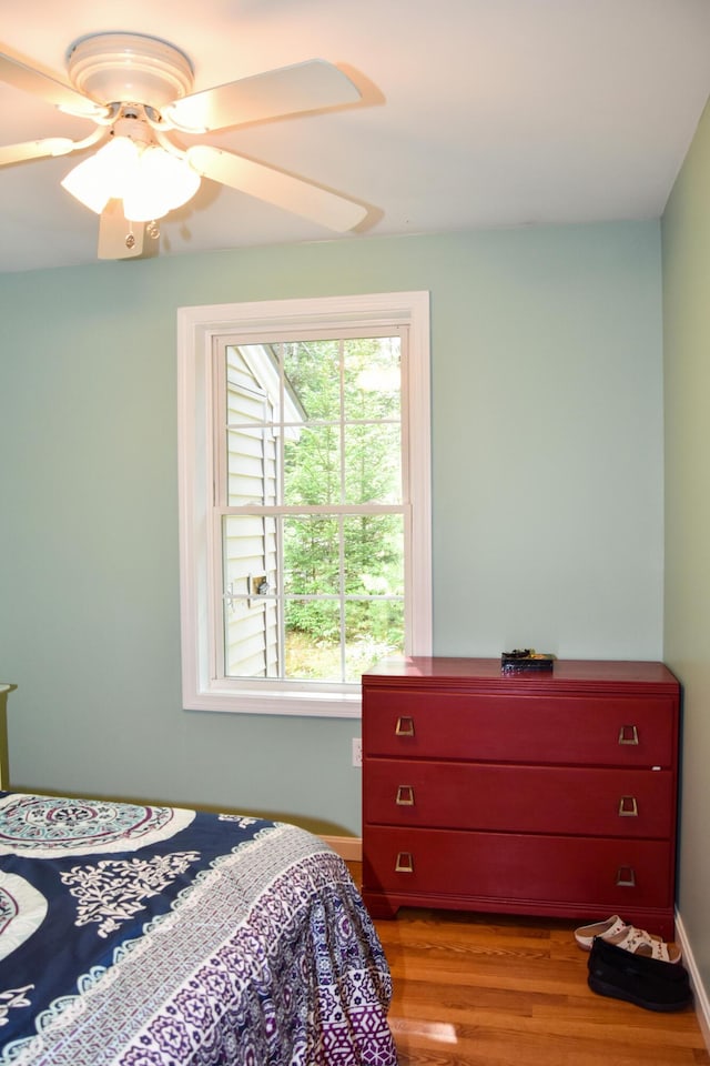 15 Good Heart Ln, Orrington, ME 04474 - bedroom with wood finished floors and a ceiling fan