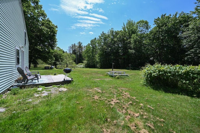 488 Bog Rd, Hermon, ME 04401 - view of green lawn with a wooden deck
