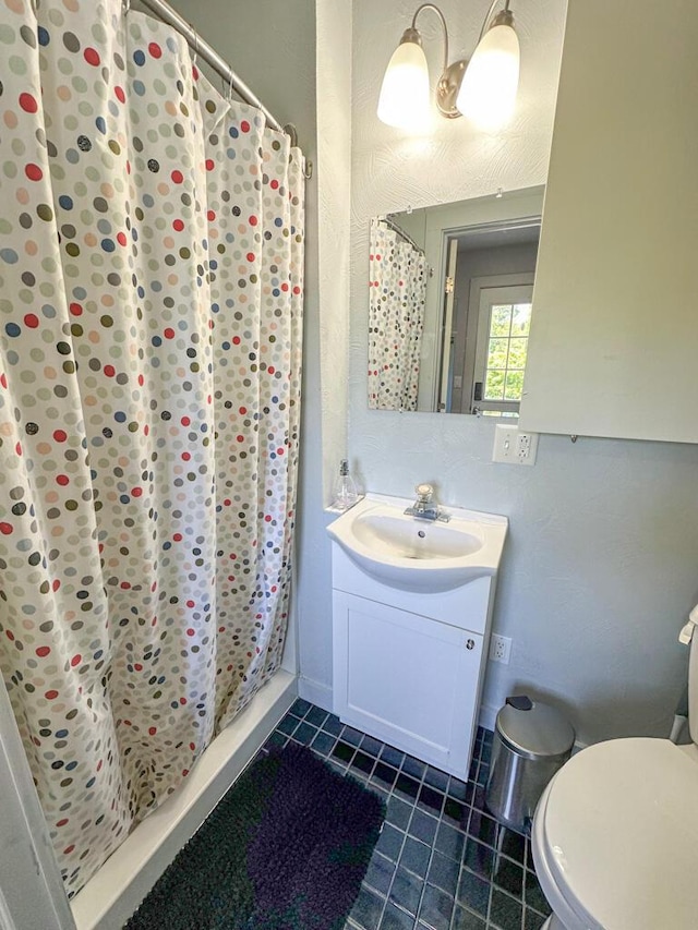 488 Bog Rd, Hermon, ME 04401 - full bath featuring tile patterned flooring, vanity, and a shower stall