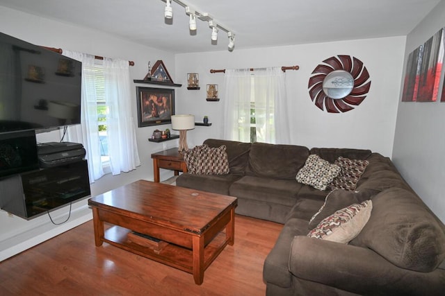 488 Bog Rd, Hermon, ME 04401 - living room featuring wood finished floors and rail lighting