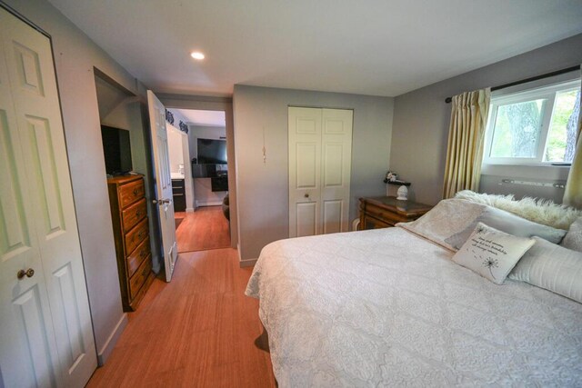 488 Bog Rd, Hermon, ME 04401 - bedroom featuring light wood-style floors, a closet, and recessed lighting