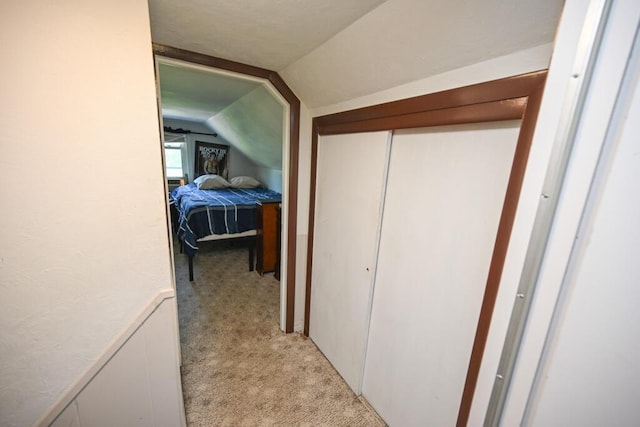 488 Bog Rd, Hermon, ME 04401 - corridor with light carpet and vaulted ceiling