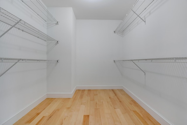 21 Cummings Way, Falmouth, ME 04105 - spacious closet featuring hardwood / wood-style flooring