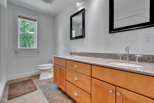 21 Cummings Way, Falmouth, ME 04105 - full bathroom featuring baseboards and double vanity