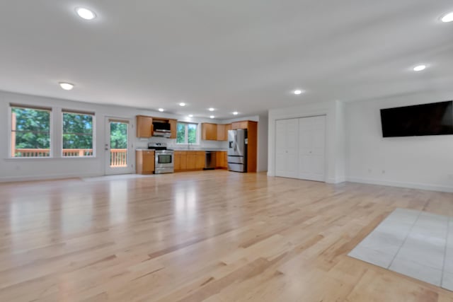 21 Cummings Way, Falmouth, ME 04105 - unfurnished living room featuring recessed lighting and light wood-style flooring