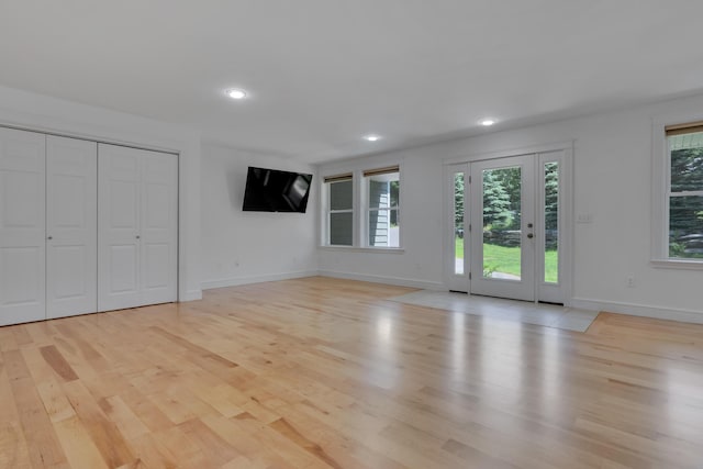 21 Cummings Way, Falmouth, ME 04105 - unfurnished living room with light wood-type flooring and recessed lighting
