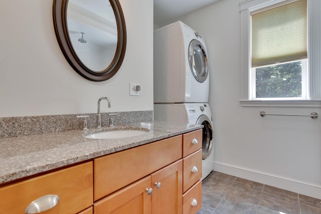 21 Cummings Way, Falmouth, ME 04105 - bathroom featuring stacked washer / dryer and vanity