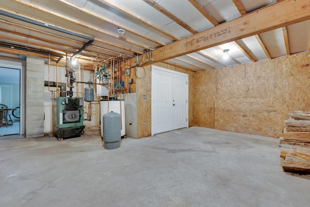 21 Cummings Way, Falmouth, ME 04105 - unfinished basement with a water pressure tank and a heating unit