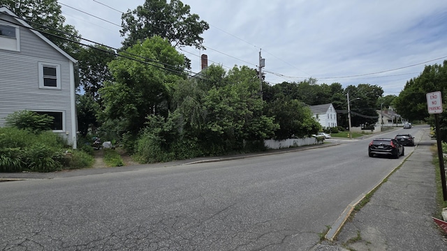 934 High St, Bath, ME 04530 - view of asphalt street featuring sidewalks, traffic signs, and curbs