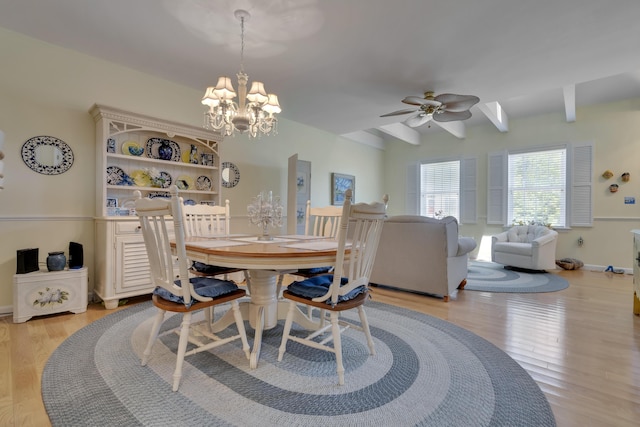 23 Chestnut Ln Unit 23, Wells, ME 04090 - dining area featuring a chandelier, light wood-style flooring, and ceiling fan