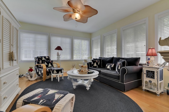23 Chestnut Ln Unit 23, Wells, ME 04090 - living area with wood finished floors and ceiling fan
