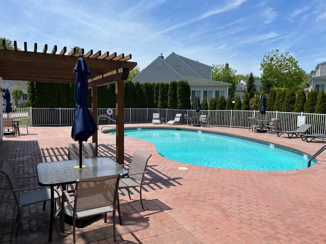 23 Chestnut Ln Unit 23, Wells, ME 04090 - community pool featuring a patio area and a pergola