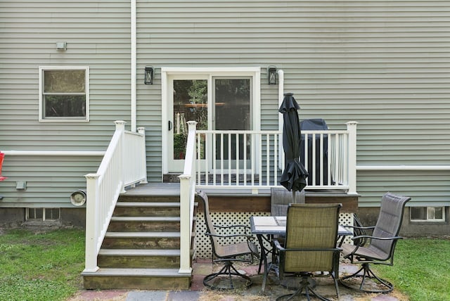 7 Dakota Ln, Dresden, ME 04342 - wooden deck with outdoor dining space