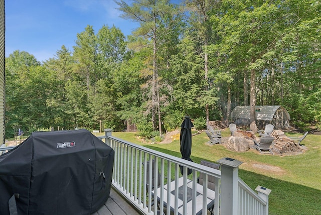 7 Dakota Ln, Dresden, ME 04342 - wooden deck featuring a grill, an outdoor fire pit, and a yard