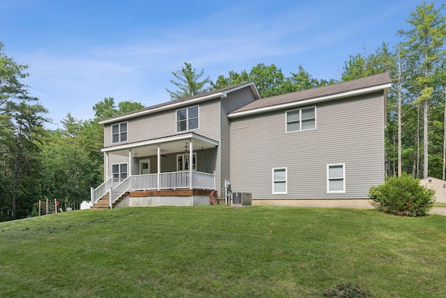7 Dakota Ln, Dresden, ME 04342 - rear view of property featuring a porch and a lawn