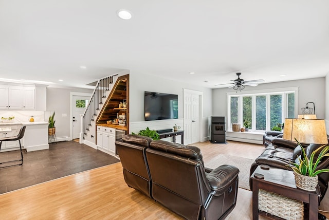7 Dakota Ln, Dresden, ME 04342 - living area with stairway, light wood-style floors, recessed lighting, ceiling fan, and a baseboard radiator