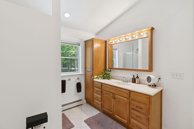 7 Dakota Ln, Dresden, ME 04342 - bathroom with a baseboard heating unit, vanity, tile patterned flooring, lofted ceiling, and an enclosed shower