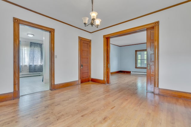 15 Snow Park, Bath, ME 04530 - empty room with baseboard heating, crown molding, a chandelier, and light wood finished floors