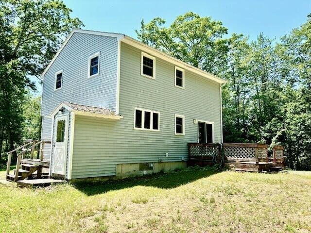 2 Oak Ridge Rd, Kennebunkport, ME 04046 - back of property featuring a yard and a wooden deck