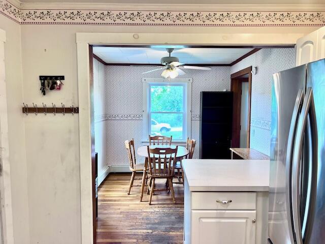 17 Pleasant St, Wilton, ME 04294 - kitchen featuring freestanding refrigerator, crown molding, wood finished floors, a ceiling fan, and white cabinets