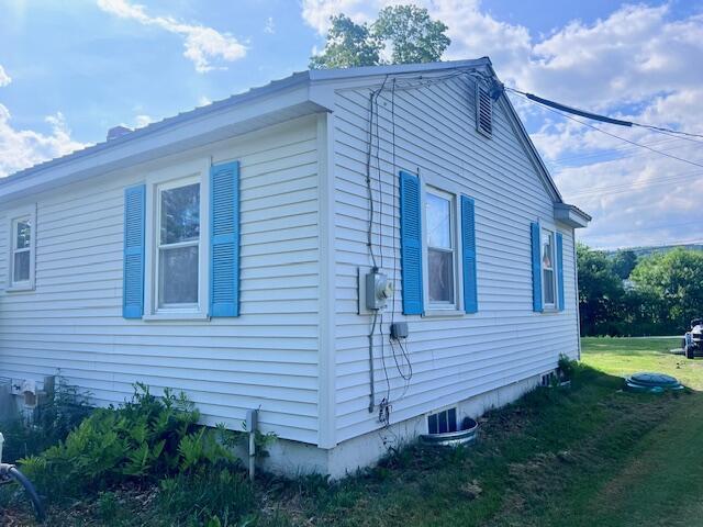 17 Pleasant St, Wilton, ME 04294 - view of home's exterior featuring a yard