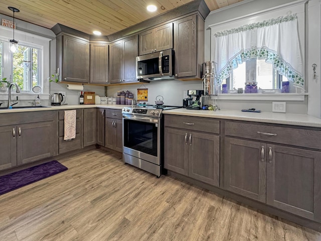 749 Main St, Madawaska, ME 04756 - kitchen with stainless steel appliances, wood ceiling, light wood-style flooring, recessed lighting, and light countertops
