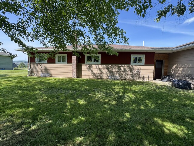 749 Main St, Madawaska, ME 04756 - ranch-style home featuring a front lawn