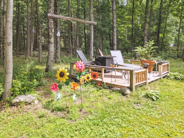 100 Starlight Dr, Brewer, ME 04412 - view of yard with a wooden deck and a view of trees
