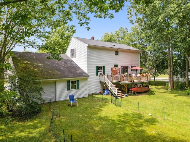 100 Starlight Dr, Brewer, ME 04412 - rear view of house with a deck, a chimney, a shingled roof, an attached garage, and stairs