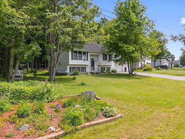 100 Starlight Dr, Brewer, ME 04412 - split foyer home featuring concrete driveway and a front lawn