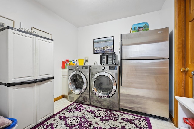 100 Starlight Dr, Brewer, ME 04412 - laundry area with cabinet space, light flooring, and washing machine and clothes dryer
