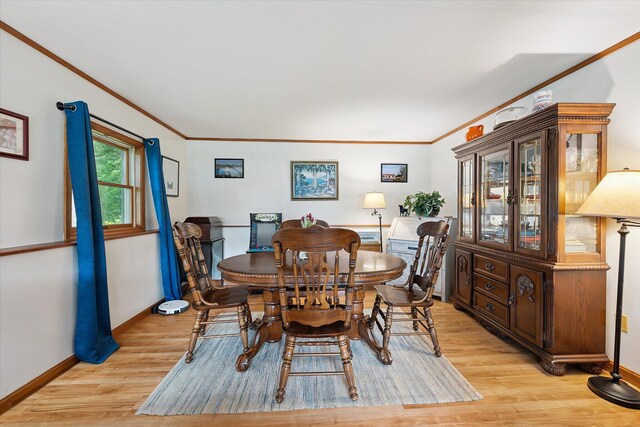 100 Starlight Dr, Brewer, ME 04412 - dining area featuring light wood finished floors and crown molding