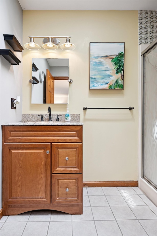 100 Starlight Dr, Brewer, ME 04412 - bathroom with a shower stall, vanity, and tile patterned floors