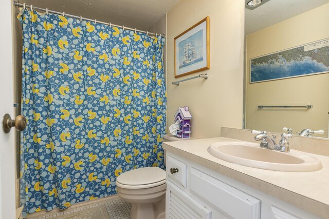 191 E Grand Ave Unit 504, Old Orchard Beach, ME 04064 - full bath featuring vanity, tile patterned flooring, and a shower with curtain