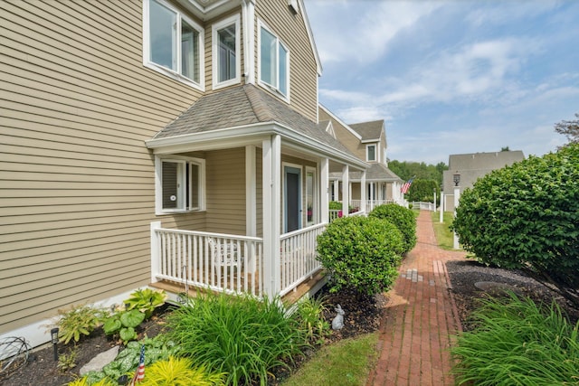 239 Sea Rd Unit 32, Kennebunk, ME 04043 - view of side of property featuring a porch