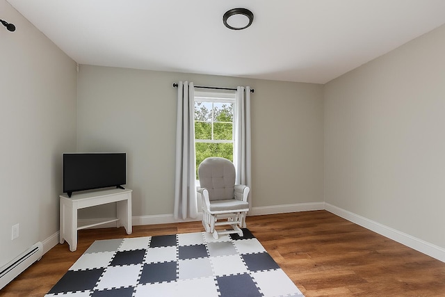 18 Serenity Ln, Harrison, ME 04040 - sitting room featuring a baseboard radiator and wood finished floors