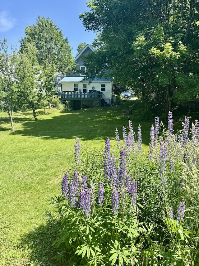 21 Wilson St, Eastport, ME 04631 - view of grassy yard featuring a deck