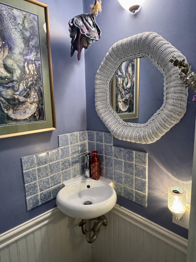 21 Wilson St, Eastport, ME 04631 - bathroom featuring a wainscoted wall and a sink