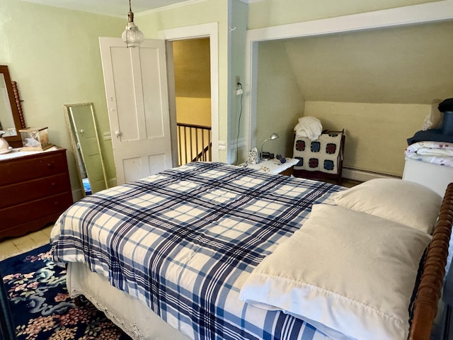 21 Wilson St, Eastport, ME 04631 - bedroom featuring lofted ceiling and a baseboard radiator