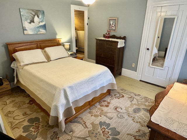 21 Wilson St, Eastport, ME 04631 - bedroom with light wood-style floors and baseboards
