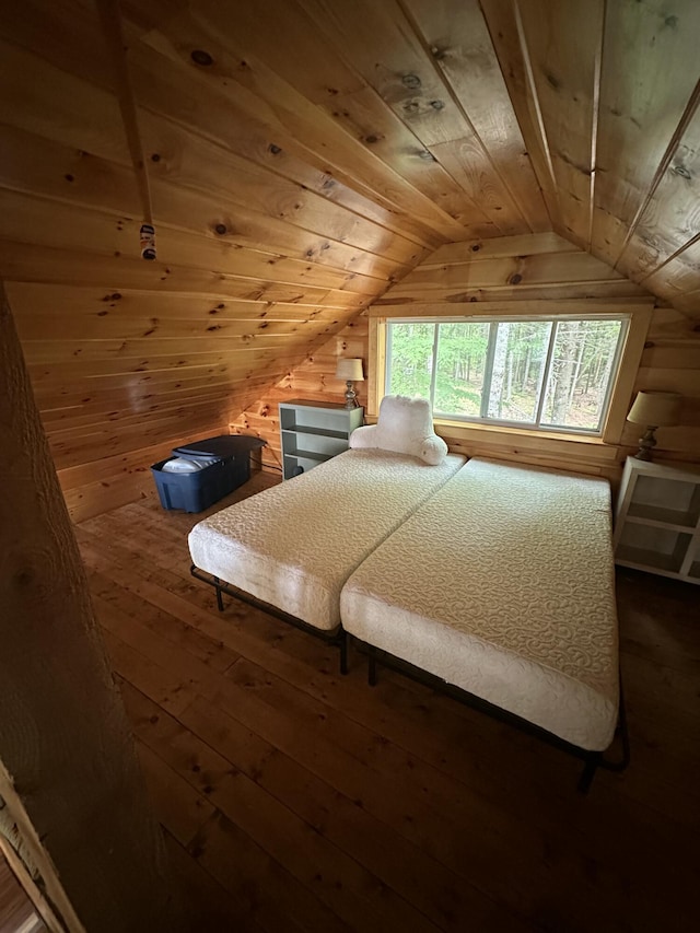 322 Lamb Rd, Roxbury, ME 04275 - bedroom with vaulted ceiling, wooden ceiling, wood walls, and hardwood / wood-style floors