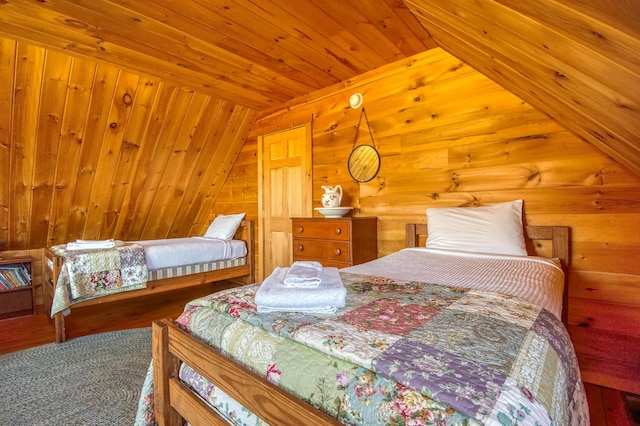 49 Winston Rd, Rangeley, ME 04970 - bedroom with lofted ceiling, wood walls, and wood ceiling