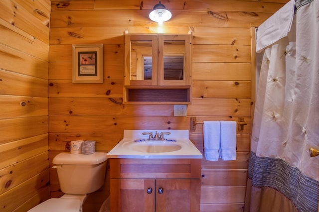 49 Winston Rd, Rangeley, ME 04970 - bathroom with vanity, wood walls, and a shower with shower curtain